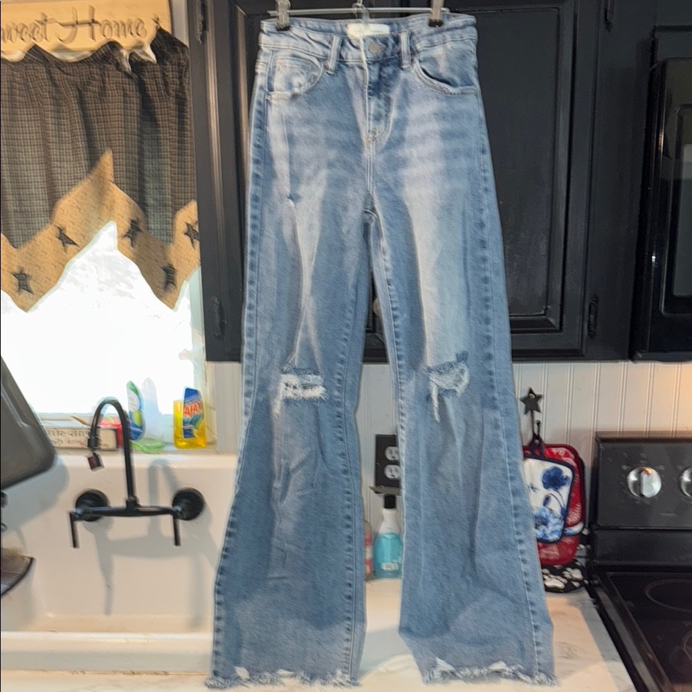 Blue Flare Wide Leg Jeans with Distressed Details
